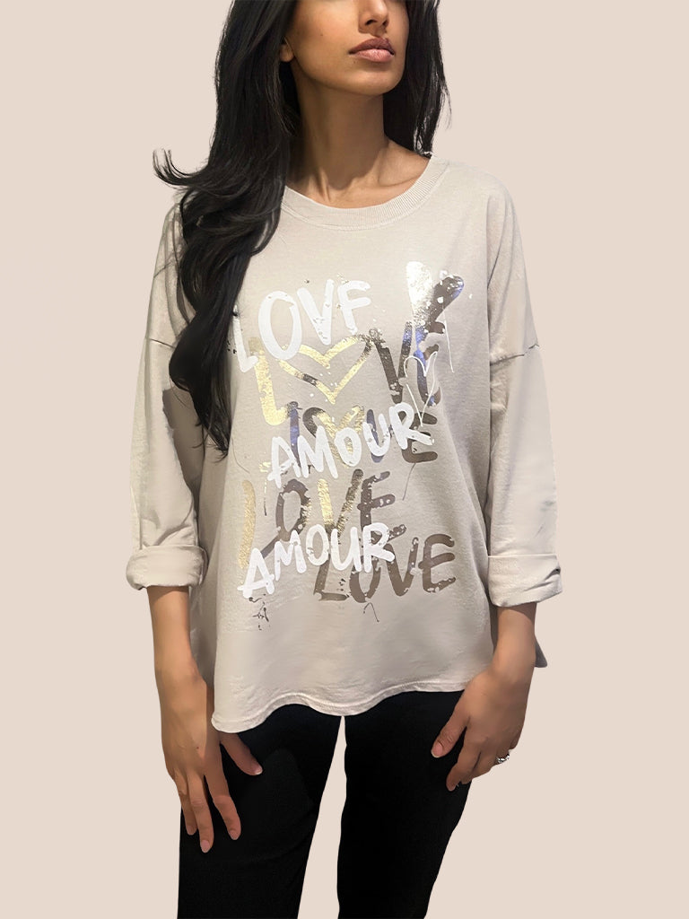 Love Amour Graffiti Dipped Hem Top