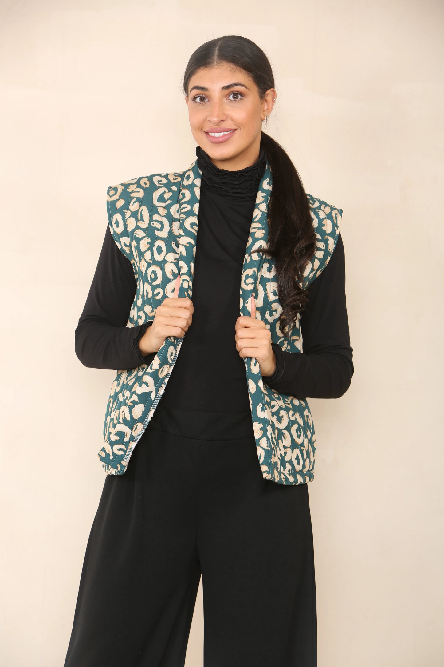 Teal Animal Print Quilted Gilet.  Sleevless quilted jacket.  Wide range of women fashion clothing for boutique women shops.